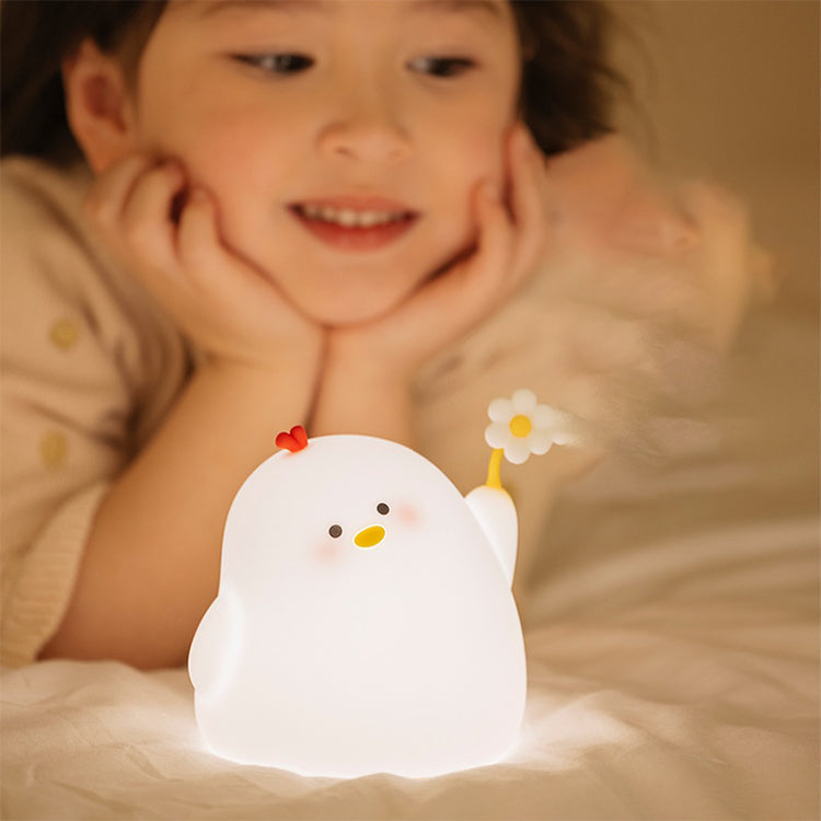 Linda luz nocturna de pollo con flores para niños la lámpara de pollo con flores es una decoración estética de dormitorio lámpara blanda de silicona de grado alimenticio